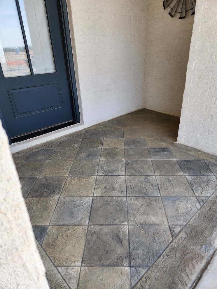 Custom Home Porch Decorative Concrete Flooring at Texas Diamondback in Lubbock